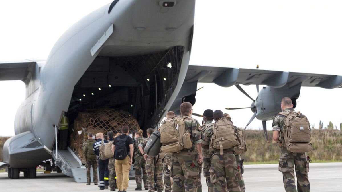 French soldiers prepare to board a military Airbus A400M to evacuate French citizens from Afghanistan, Monday, Aug.16, 2021 in Orleans, central France.