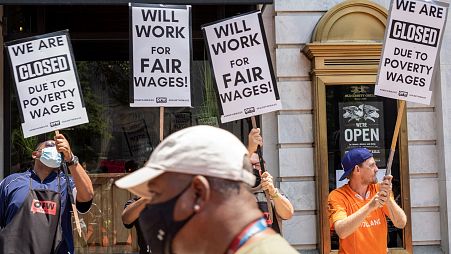 US restaurant workers protested over low pay this year, demanding to be paid the minimum wage plus tips.