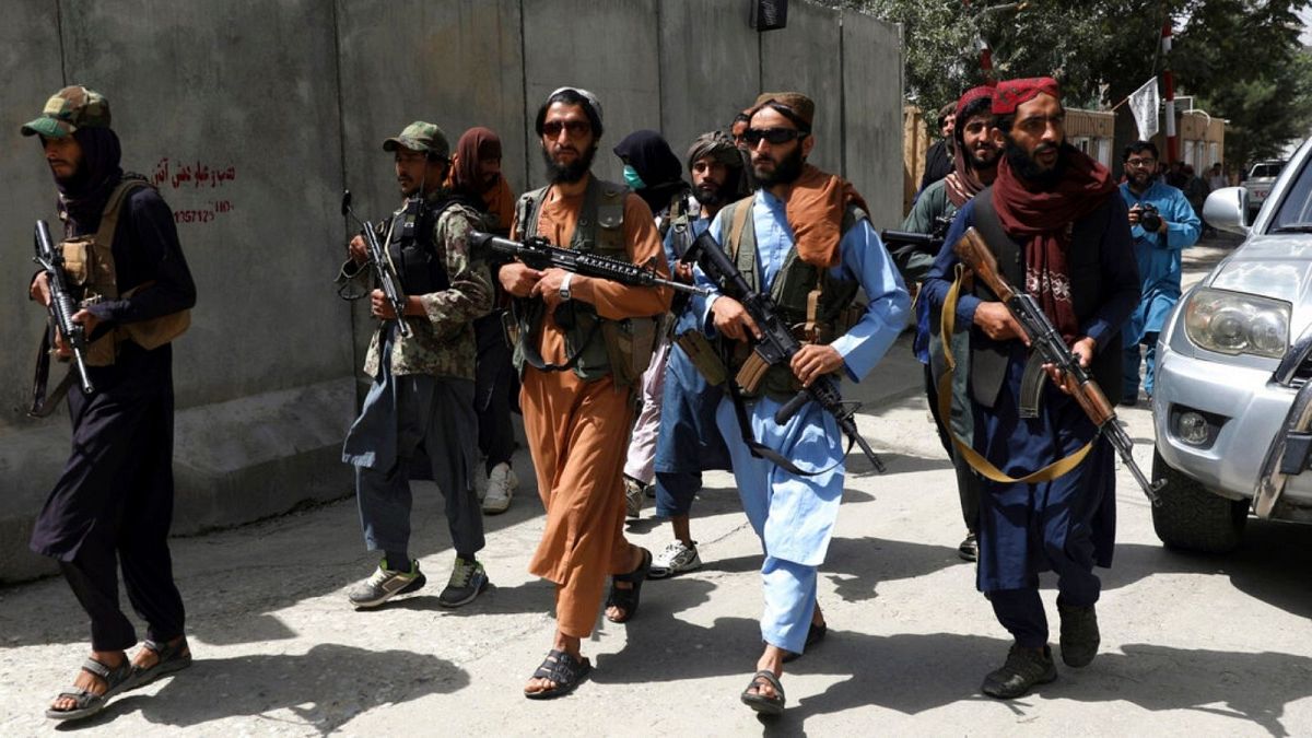 Taliban fighters patrol in the city of Kabul