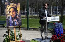 Ahmad Massoud, son of late Afghan commander Ahmad Shah Massoud delivers a speech next to a portait of his father 