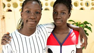 13 year old Senegalese twin girls graduate high school with impressive scores