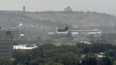 FILE-A US military helicopter is pictured flying above the US embassy in Kabul on August 15, 2021. FILE-A US military helicopter is pictured flying above the US embassy in Kabul on August 15, 2021.
