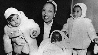 Actress Josephine Baker is in her apartment at the Hotel Forresta near Stockholm, Sweden on Dec. 7, 1957, with three of her adopted children.