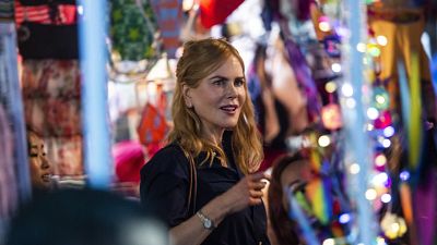 Actress Nicole Kidman films a scene in a market in Hong Kong.