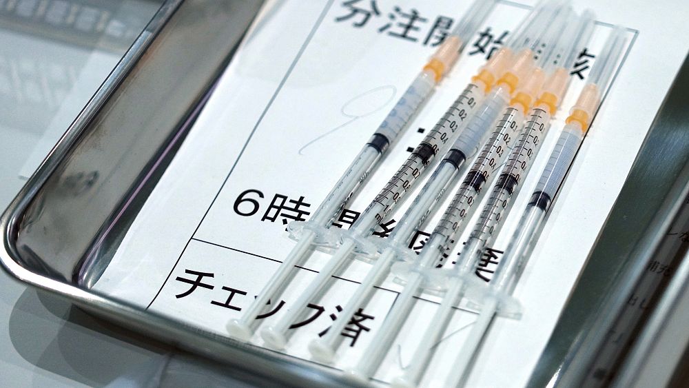 Japan suspends use of 1.63m Moderna vaccines over contamination fears