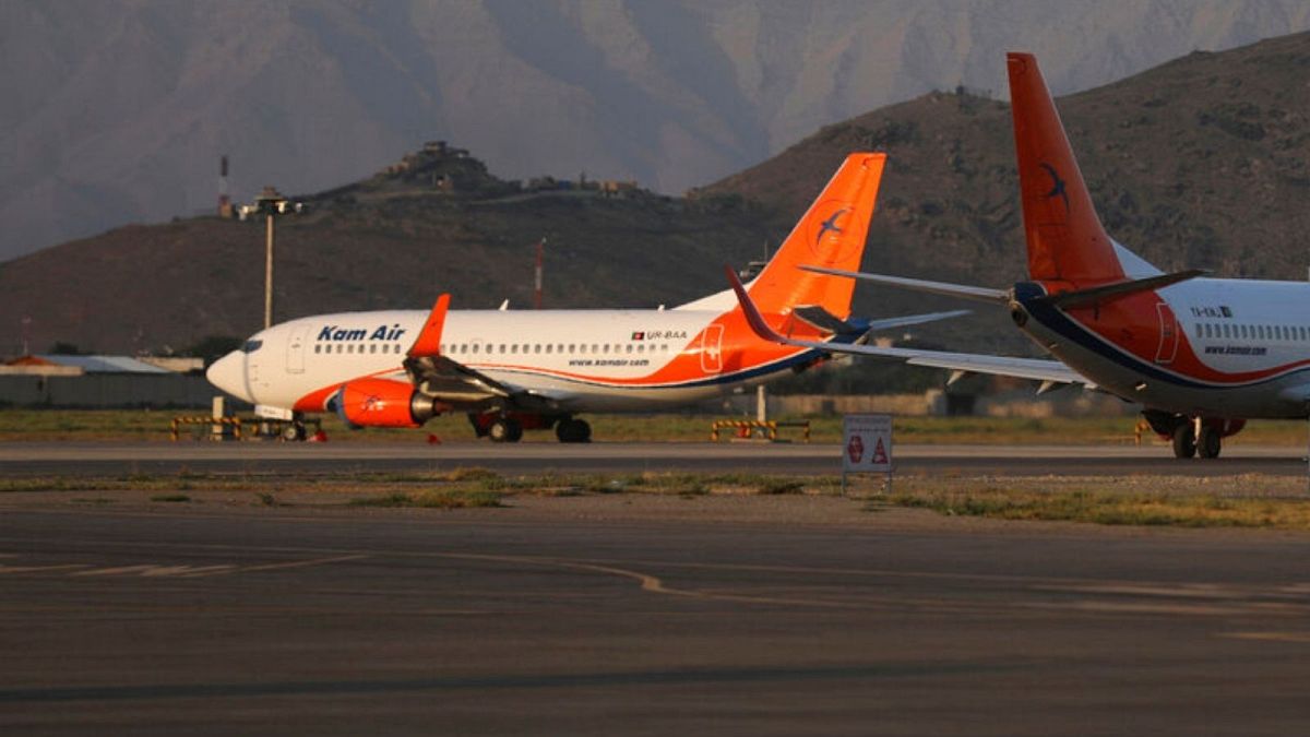 Kam Air planes are parked at Hamid Karzai International Airport in Kabul