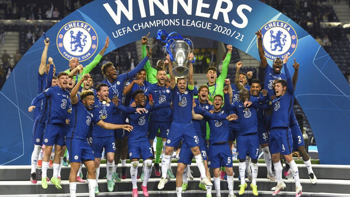 Chelsea's team captain Cesar Azpilicueta lifts the trophy at the end of the Champions League final soccer match between Manchester City and Chelsea in Porto