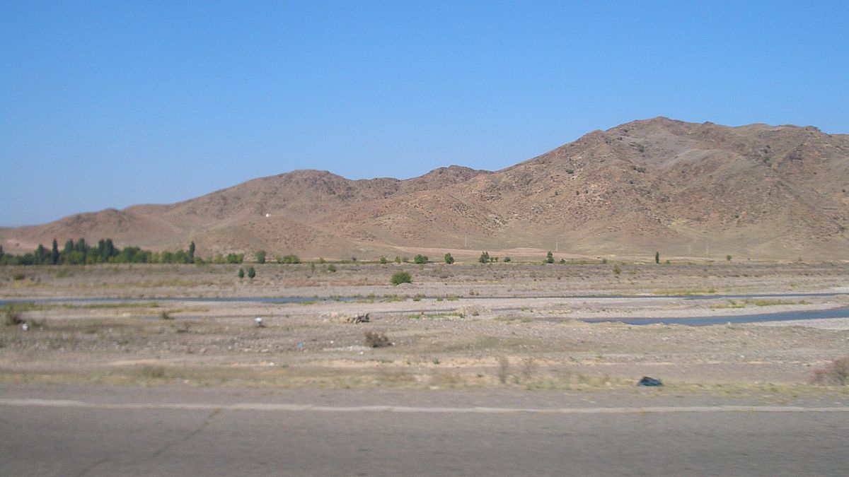 Looking across the Chu from Kyrgyzstan's Chuy Province (the northern Bishkek-Tokmak highway) into Kazakhstan's Zhambyl Province (Korday District).