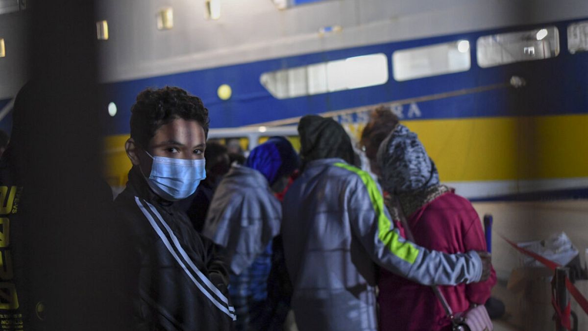Some 80 unaccompanied minors from the island of Lampedusa's migrant housing center, Sicily, are embarked on the ship Cossyra, Wednesday, May 12, 2021