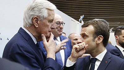 Il nuovo primo ministro francese Michel Barnier con il presidente Emmanuel Macron alla Fiera internazionale dell'agricoltura, Parigi, 23 febbraio 2019 