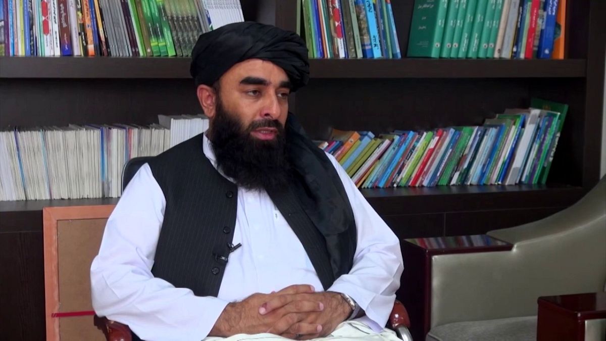 Taliban spokesman Zabihullah Mujahid says Western troops that stay will be considered a continuation of the invasion.