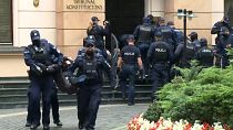 Police drag activists out of court in Poland