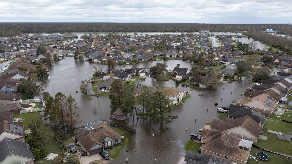 Flooded streets and homes are shown in the Spring Meadow subdivision in LaPlace, La., after Hurricane Ida moved through, Aug. 30, 2021. 
