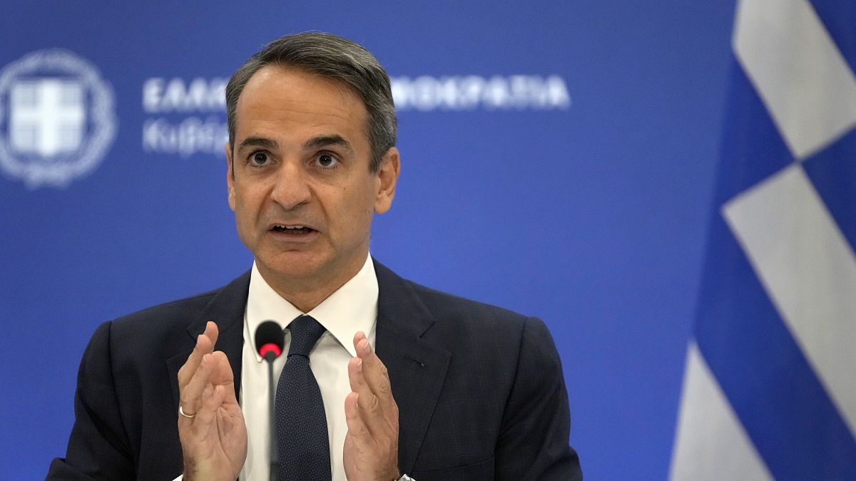 Greece's Prime Minister Kyriakos Mitsotakis speaks during a press conference in Athens, Aug. 12, 2021.