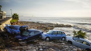 Flash floods swept cars down streets in the Catalan town of Alcanar.