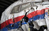 The reconstructed wreckage of Malaysia Airlines Flight MH17 at the Gilze-Rijen military airbase in the Netherlands.