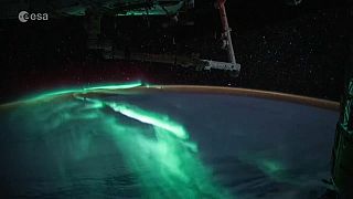 Aurora boreal vista do espaço