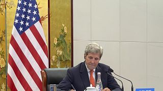 US Special Presidential Envoy for Climate John Kerry attends a meeting with Chinese Foreign Minister Wang Yi via video link in Tianjin, China.