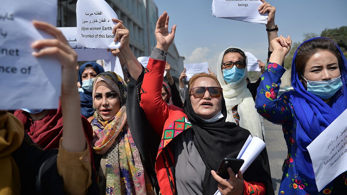 Afghan women take part in a protest march for their rights under the Taliban rule