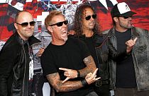 Soldan sağa Metallica grubunun üyeleri Lars Ulrich, James Hetfield, Kirk Hammett ve Robert Trujillo. Meksika turundan bir kare (2019).