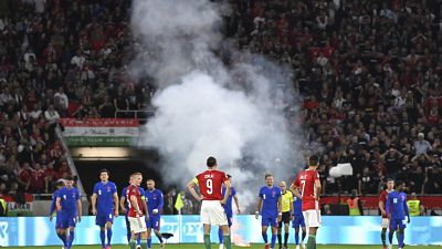 A flare was also thrown onto the field during this month's FIFA World Cup Qualifier in Budapest.