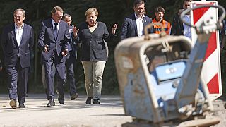 Németország: Merkel és Laschet az árvizek helyszínén kampányoltak