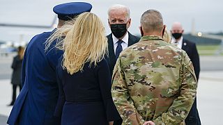President Joe Biden and Jill Biden are greeted as they arrive at Dover Air Force Base, Del., Sunday, Aug. 29, 2021.