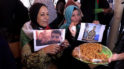 Families of the prisoners inside the Red Cross building in Gaza