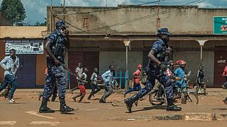 Uganda charges opposition MPs over machete killings