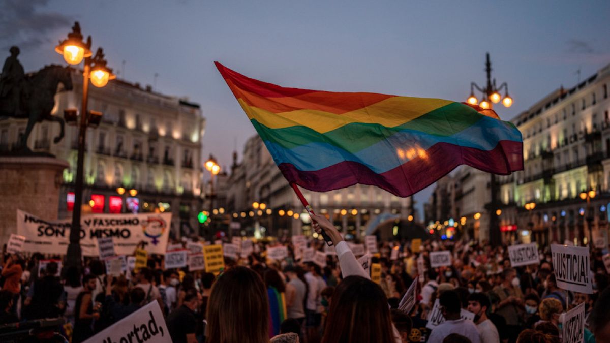 People gather at a protest at Sol square in Madrid.
