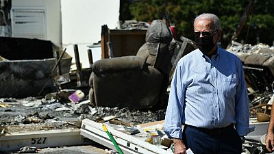 US President Joe Biden tours a neighbourhood affected by Hurricane Ida in Manville, New Jersey on September 7, 2021.