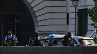 Security forces guard an entrance of the Palace of Justice Wednesday, Sept. 8, 2021 in Paris. 
