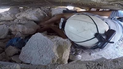 Child pulled from rubble after shelling in Idlib