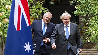 Britain's Prime Minister Boris Johnson with Australian Prime Minister Scott Morrison, in the garden of 10 Downing Street after agreeing a trade deal, London, June 15, 2021.