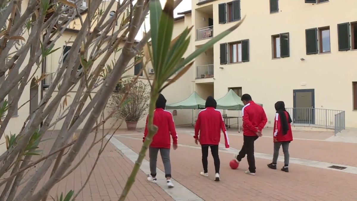 Young Afghan women playing football in Italy