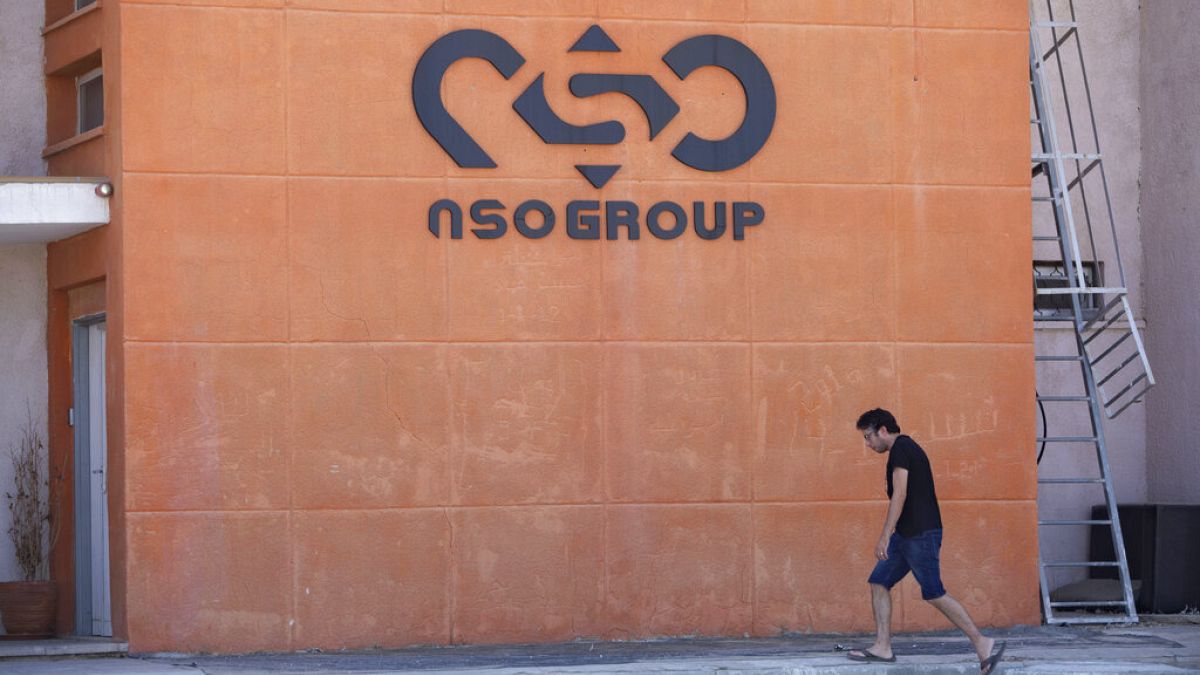 A logo adorns a wall on a branch of the Israeli NSO Group company, near the southern Israeli town of Sapir, Tuesday, Aug. 24, 2021.