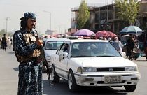 Taliban fighter stand guards in the city of Kabul, Afghanistan, Saturday, Sept. 4, 2021.