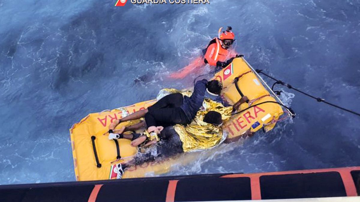 A rescue swimmer during a rescue operation of migrants by patrol boats of the Lampedusa Coast Guard.