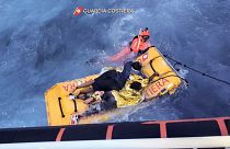 A rescue swimmer during a rescue operation of migrants by patrol boats of the Lampedusa Coast Guard.