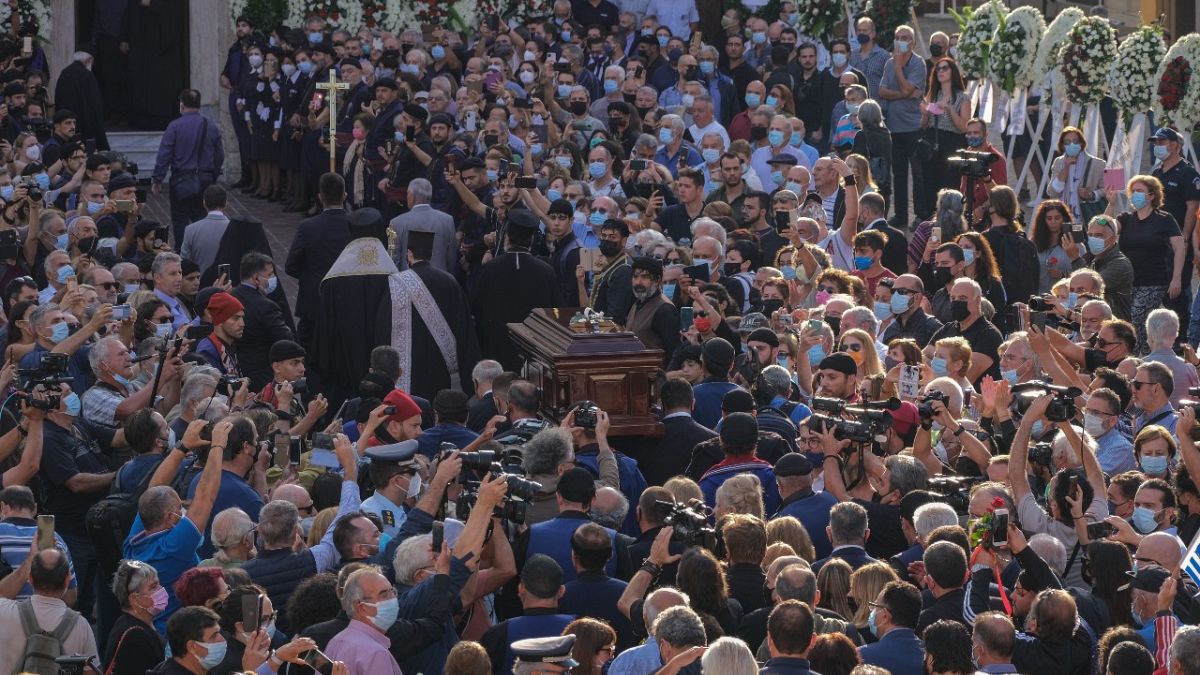 Pallbearers carry coffin of Greek composer Mikis Theodorakis outside the Metropolitan church, prior to his funeral service, in Chania, Crete island, Greece, September 9 2021