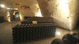 In this Wednesday, Oct. 16, 2013 photo, bottles of champagne are piled up inside the Veuve Clicquot Ponsardin cellars in Reims, eastern France