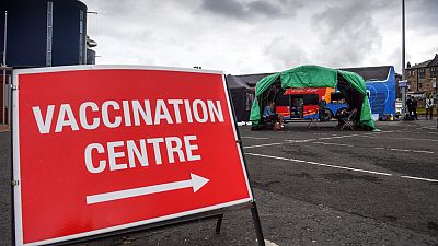 A sign points the way to the Scottish Ambulance Service vaccine bus in Glasgow on July 28, 2021. A sign points the way to the Scottish Ambulance Service vaccine bus in Glasgow on July 28, 2021.