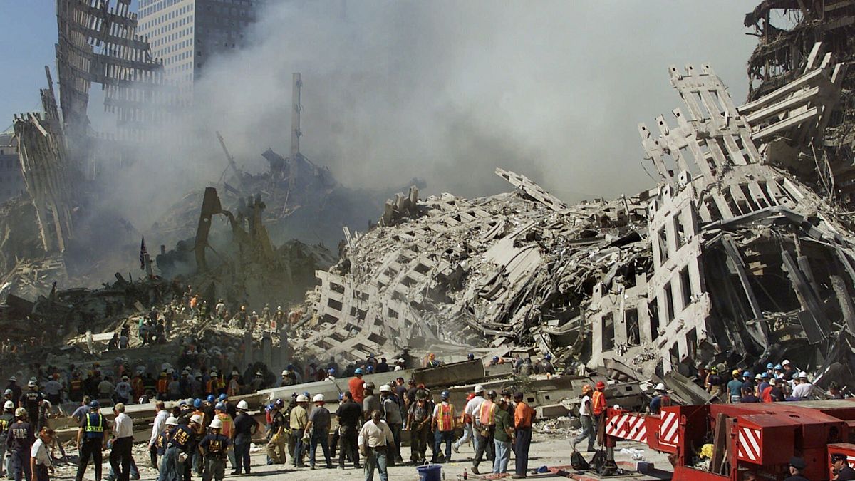 Rescue workers comb through debris for survivors at the site of the World Trade Centre in New York, on September 13, 2001.