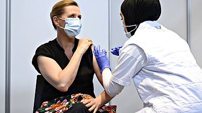Danish Prime Minister Mette Frederiksen is vaccinated against covid-19, in Copenhagen, Denmark, Friday, June 4, 2021. 