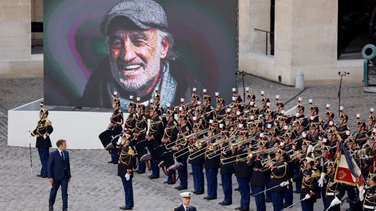 France's President Emmanuel Macron pays a national tribute to late French actor Jean-Paul Belmondo at the Hotel des Invalides in Paris, on September 9, 2021.