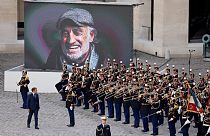 France's President Emmanuel Macron pays a national tribute to late French actor Jean-Paul Belmondo at the Hotel des Invalides in Paris, on September 9, 2021.