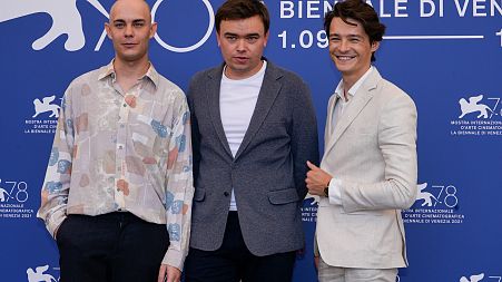 Mateusz Gorski, from left, Jan P. Matuszynski and Tomasz Zietek  at the photo call for the film 'Leave No Traces' during the Venice Film Festival, Sept. 9, 2021. 