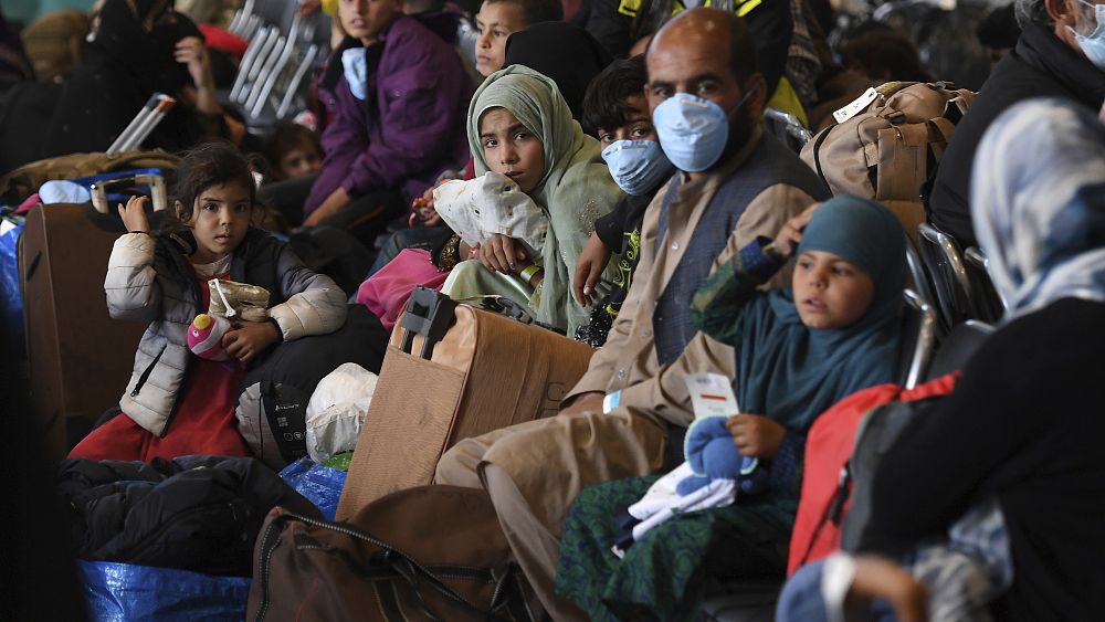 Measles cases halt Afghan evacuee flights from two key bases thumbnail