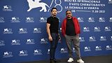 Filipino actor Dennis Trillo (L) and Filipino director Erik Matti attend a photocall for the film "On the Job: The Missing 8" at the Venice Film Festival on September 10, 2021