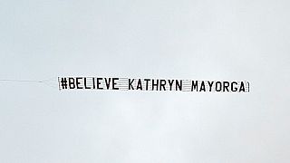 The banner, saying Believe Kathryn Mayorga, was flown over Manchester United's Old Trafford stadium.